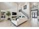 Stunning living room features a fireplace, staircase, and an open layout with wood-look tile floors at 12409 Gentle Swan Pl, Odessa, FL 33556