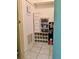 A compact storage closet equipped with shelves and drawers for organized living at 1257 Drew St # 8, Clearwater, FL 33755
