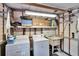 Garage laundry area with updated machines and utility sink at 1655 Owen Dr, Clearwater, FL 33759