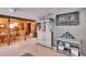 Stylish living area showcasing a wet bar and a partial view of the dining area at 1655 Owen Dr, Clearwater, FL 33759