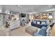 Cozy living room with stylish decor, comfortable seating, and wood-look floors at 1655 Owen Dr, Clearwater, FL 33759