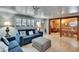 Open-concept living space with comfortable sofas, stylish decor, and seamless flow at 1655 Owen Dr, Clearwater, FL 33759
