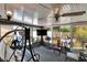 Enclosed sunroom featuring a ceiling fan, casual seating, a tv, and plenty of natural light at 1655 Owen Dr, Clearwater, FL 33759