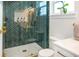 Stylish bathroom with a tiled shower, glass door, neutral decor, and modern fixtures at 1725 Massachusetts Ne Ave, St Petersburg, FL 33703
