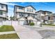 Charming exterior view of a bright home with white gravel driveway and a two-car garage at 1725 Massachusetts Ne Ave, St Petersburg, FL 33703
