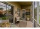 Inviting screen enclosed patio featuring outdoor seating, sliding glass doors, and ample natural light at 18919 Place Marquette, Lutz, FL 33558