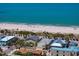 Scenic aerial view of beach homes with private pools and easy access to the pristine sandy beach and Gulf waters at 2003 Gulf Way, St Pete Beach, FL 33706