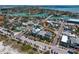 Stunning aerial view of coastal neighborhood featuring charming homes, winding waterways, and beautiful Gulf views at 2003 Gulf Way, St Pete Beach, FL 33706