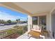 Balcony overlooking the beach with comfortable seating to enjoy the ocean breeze at 2003 Gulf Way, St Pete Beach, FL 33706