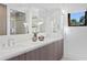 Stylish bathroom featuring a double vanity, modern fixtures, and elegant decor at 2003 Gulf Way, St Pete Beach, FL 33706