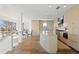Spacious modern kitchen featuring stainless steel appliances, sleek cabinetry, and open layout to dining area at 2003 Gulf Way, St Pete Beach, FL 33706