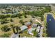 Aerial view of the property showcasing its location within a lush, green community with ponds at 2202 Clubhouse Dr # 174, Sun City Center, FL 33573