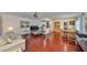 Spacious living room featuring hardwood floors, and a ceiling fan at 2202 Clubhouse Dr # 174, Sun City Center, FL 33573