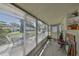 Enclosed porch area with abundant sunlight and exterior views at 2202 Clubhouse Dr # 174, Sun City Center, FL 33573
