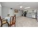 Spacious eat-in kitchen with tile floors, stainless appliances and grey cabinetry at 2229 Americus W Blvd # 25, Clearwater, FL 33763
