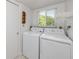 An indoor laundry room featuring a washer and dryer at 2229 Americus W Blvd # 25, Clearwater, FL 33763