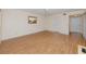 Living room featuring a ceiling fan, laminate flooring and closet doors at 2229 Americus W Blvd # 25, Clearwater, FL 33763