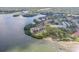 Beautiful aerial view of community buildings next to bay with lush green landscaping at 2700 Bayshore Blvd # 532, Dunedin, FL 34698