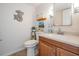 Half bathroom featuring stylish decor and a modern vanity at 2700 Bayshore Blvd # 532, Dunedin, FL 34698