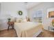 Bright bedroom with scenic views, hardwood floors, and stylish decor at 2700 Bayshore Blvd # 532, Dunedin, FL 34698