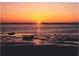 Sunset on the water with a colorful sky and silhouetted boats at 2700 Bayshore Blvd # 532, Dunedin, FL 34698