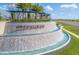 Impressive stone waterfall feature at the entrance to the Winding Ridge community at 32212 Mahogany Valley Dr, Wesley Chapel, FL 33543