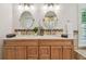 Double vanity bathroom with granite countertops and decorative backsplash at 3398 Pinnacle S Ct, Palm Harbor, FL 34684