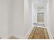 Hallway with tile floors and access to bathroom at 3398 Pinnacle S Ct, Palm Harbor, FL 34684