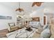 Spacious living room featuring high ceilings, a neutral color palette, and hardwood floors at 3398 Pinnacle S Ct, Palm Harbor, FL 34684