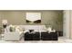 Comfortable living room showcasing a stylish sofa, decorative pillows, and modern coffee tables at 35114 Brackett Bnd, Zephyrhills, FL 33541