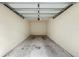 Empty garage, perfect for storing cars, tools, and other belongings; awaiting your personal touch at 4207 S Dale Mabry Hwy # 3302, Tampa, FL 33611