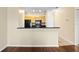 Kitchen view with breakfast bar and black appliances at 4207 S Dale Mabry Hwy # 3302, Tampa, FL 33611