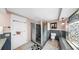 Shower room with an updated tiled shower stall and built-in shower seat at 500 Oleander S Way, St Petersburg, FL 33707