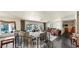 Spacious living room features large sliding glass doors to pool and patio area at 500 Oleander S Way, St Petersburg, FL 33707