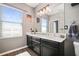 Stylish bathroom featuring a modern vanity, decorative mirror, and coastal accents at 5524 Yellowfin Ct, New Port Richey, FL 34652