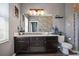 Charming bathroom with stone accent wall, modern lighting, and a sleek vanity at 5524 Yellowfin Ct, New Port Richey, FL 34652