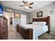 Cozy bedroom with neutral walls and brick accent wall at 5524 Yellowfin Ct, New Port Richey, FL 34652