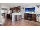 Open-concept living room and kitchen with modern finishes and stainless appliances at 5524 Yellowfin Ct, New Port Richey, FL 34652