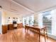 Bright dining room with natural light, wood flooring, and neutral decor provides a welcoming atmosphere at 5533 97Th N Way, St Petersburg, FL 33708