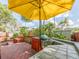 Outdoor kitchen with a wooden deck, lush landscaping, and a built-in barbecue for ultimate outdoor entertaining at 5533 97Th N Way, St Petersburg, FL 33708