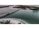 Stunning aerial view of the bridge connecting Anna Maria Island, offering picturesque waterfront scenery and access at 636 Tarawitt Dr, Longboat Key, FL 34228
