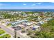 Charming coastal community featuring vibrant shops, nearby restaurants, and proximity to the beautiful bay at 636 Tarawitt Dr, Longboat Key, FL 34228