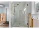 Bathroom featuring frameless glass shower with modern fixtures, awaiting renovation at 636 Tarawitt Dr, Longboat Key, FL 34228
