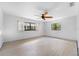 Bedroom features bright natural light and a ceiling fan at 636 Tarawitt Dr, Longboat Key, FL 34228