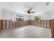 Bedroom features bright natural light, a ceiling fan, and framing exposed at 636 Tarawitt Dr, Longboat Key, FL 34228