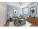 A charming bedroom with new furniture, decor, a mini-split AC and wood-look flooring at 636 Tarawitt Dr, Longboat Key, FL 34228