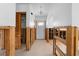 Bright entryway featuring tile flooring, a chandelier, and a front door with glass panes awaiting renovation at 636 Tarawitt Dr, Longboat Key, FL 34228