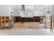 Kitchen area undergoing visible renovations with tile flooring and a view of the front yard at 636 Tarawitt Dr, Longboat Key, FL 34228