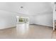 Spacious living room with tile flooring and a view of the outside at 636 Tarawitt Dr, Longboat Key, FL 34228
