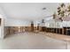 Spacious living room with plumbing, electrical, and framing exposed at 636 Tarawitt Dr, Longboat Key, FL 34228
